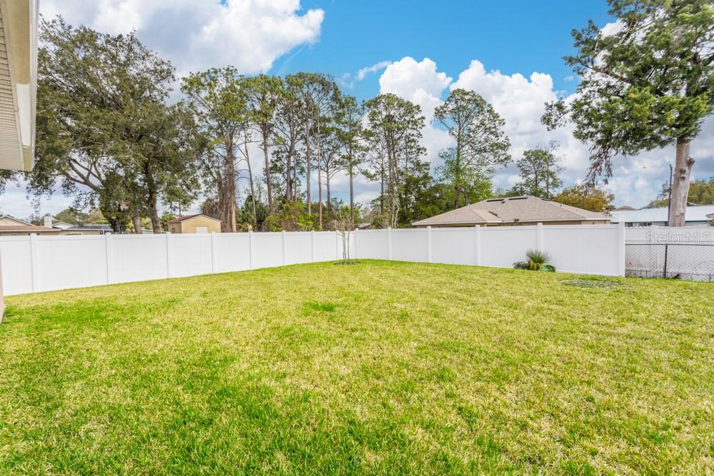 Rear yard - 10 FISCHER LN, PALM COAST