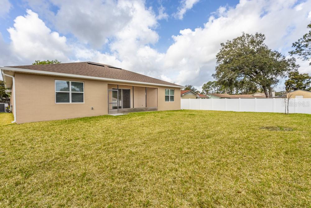 Rear view of the house - 10 FISCHER LN, PALM COAST