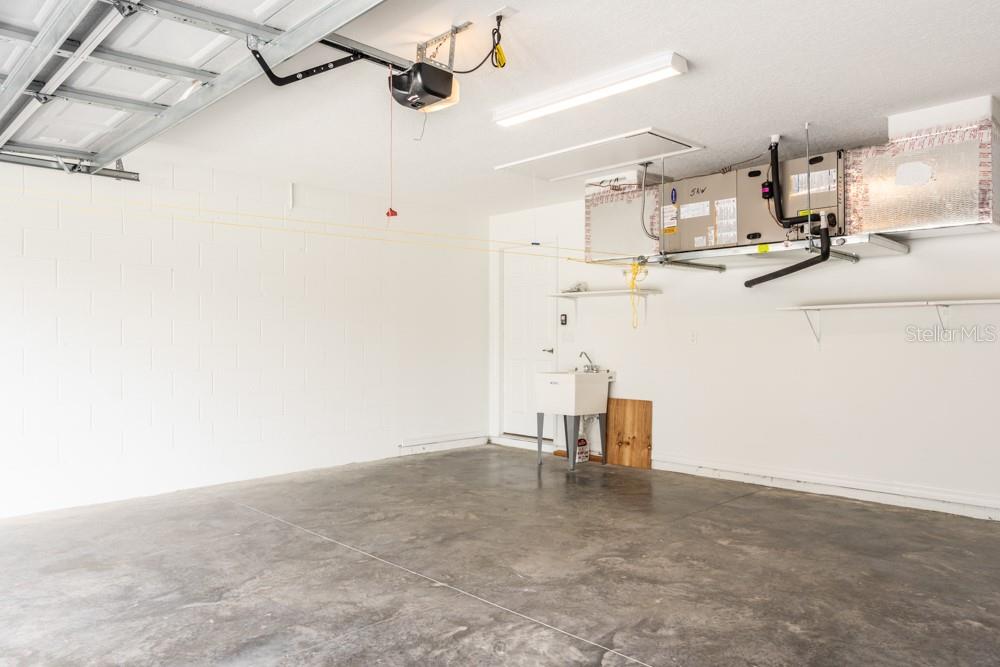 Garage with an attic and pull down folded stairs - 10 FISCHER LN, PALM COAST