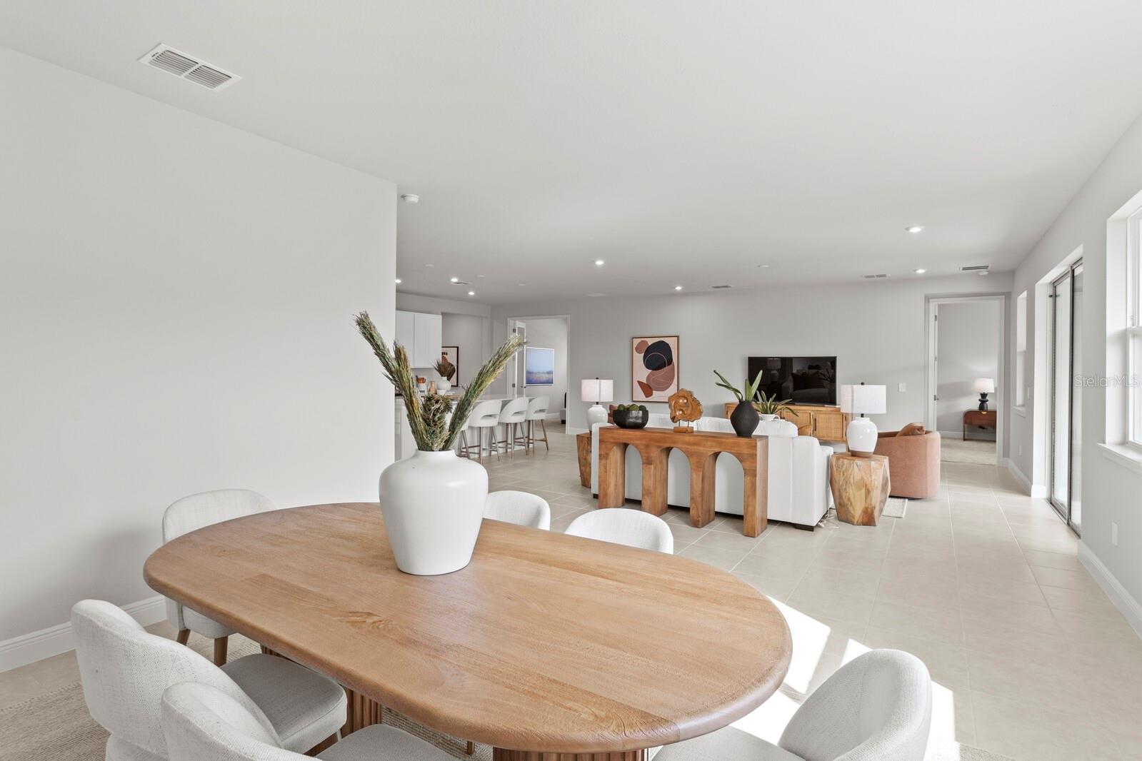 Staged Dining with Living Room View - 5030 123RD AVE E, PARRISH