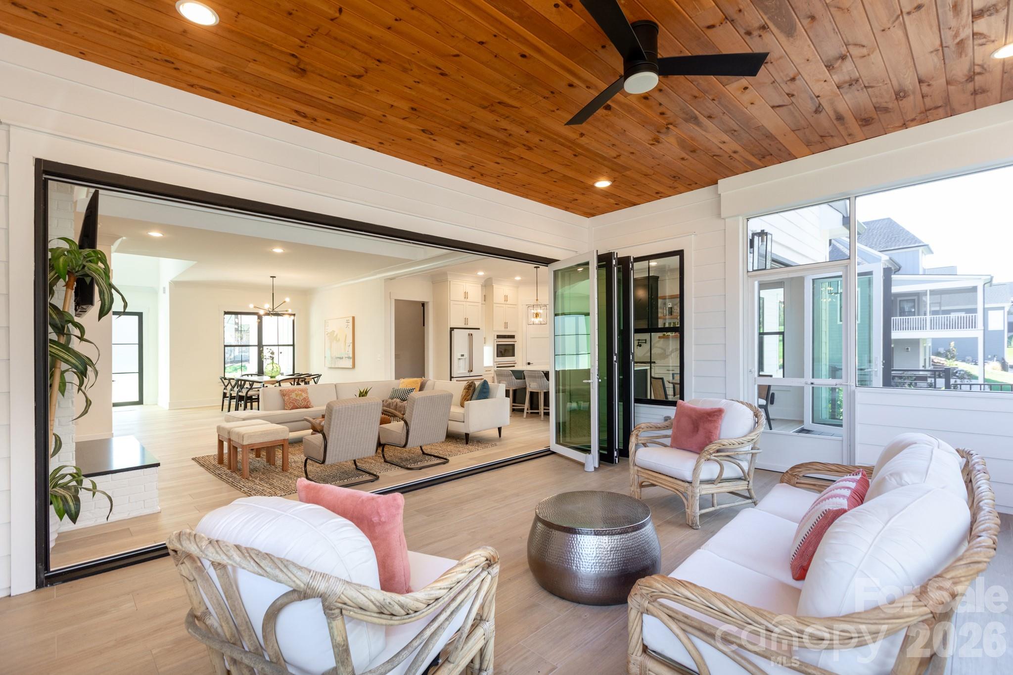 Beautiful pine ceiling makes this amazing screened in porch so cozy! - 124 Direct Drive, Mooresville