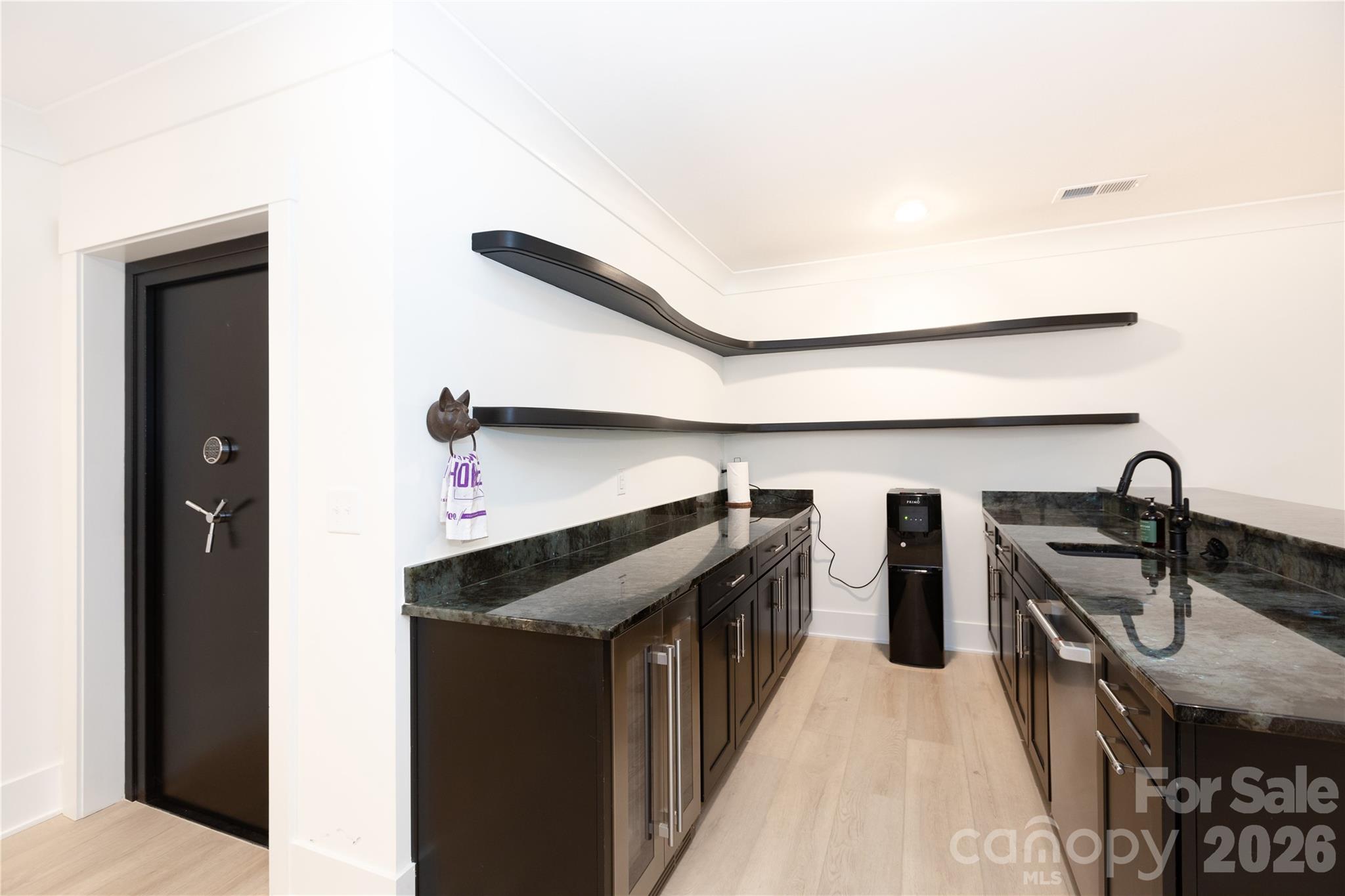 Entertaining bar w/Labradorite counters, beverage fridge and dishwasher - 124 Direct Drive, Mooresville