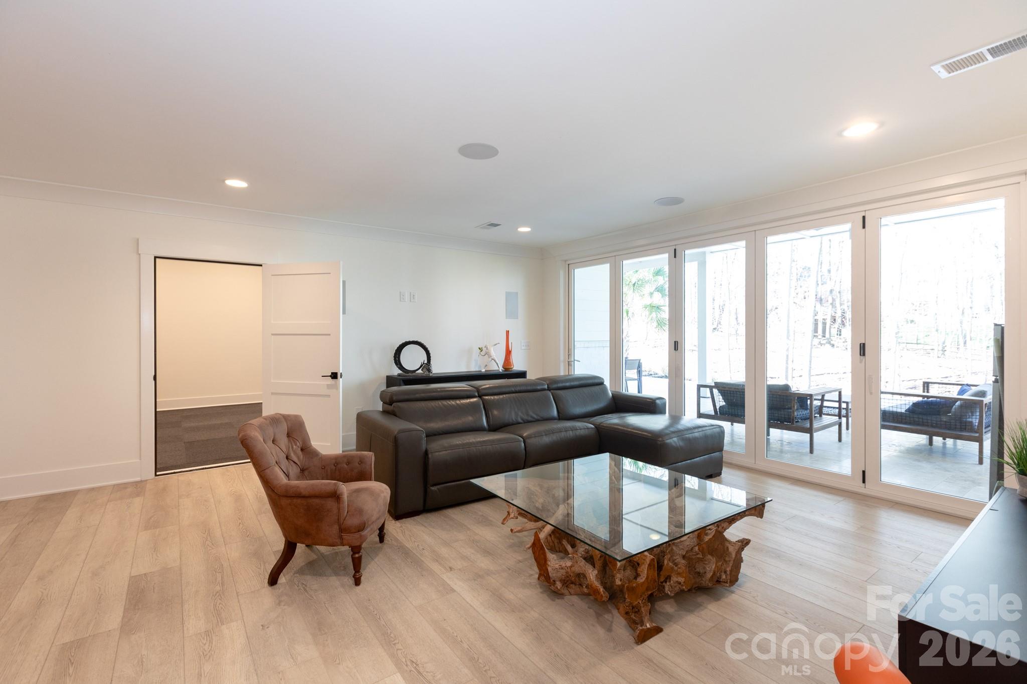 Bifold doors allow you to flow seamlessly inside and out - 124 Direct Drive, Mooresville