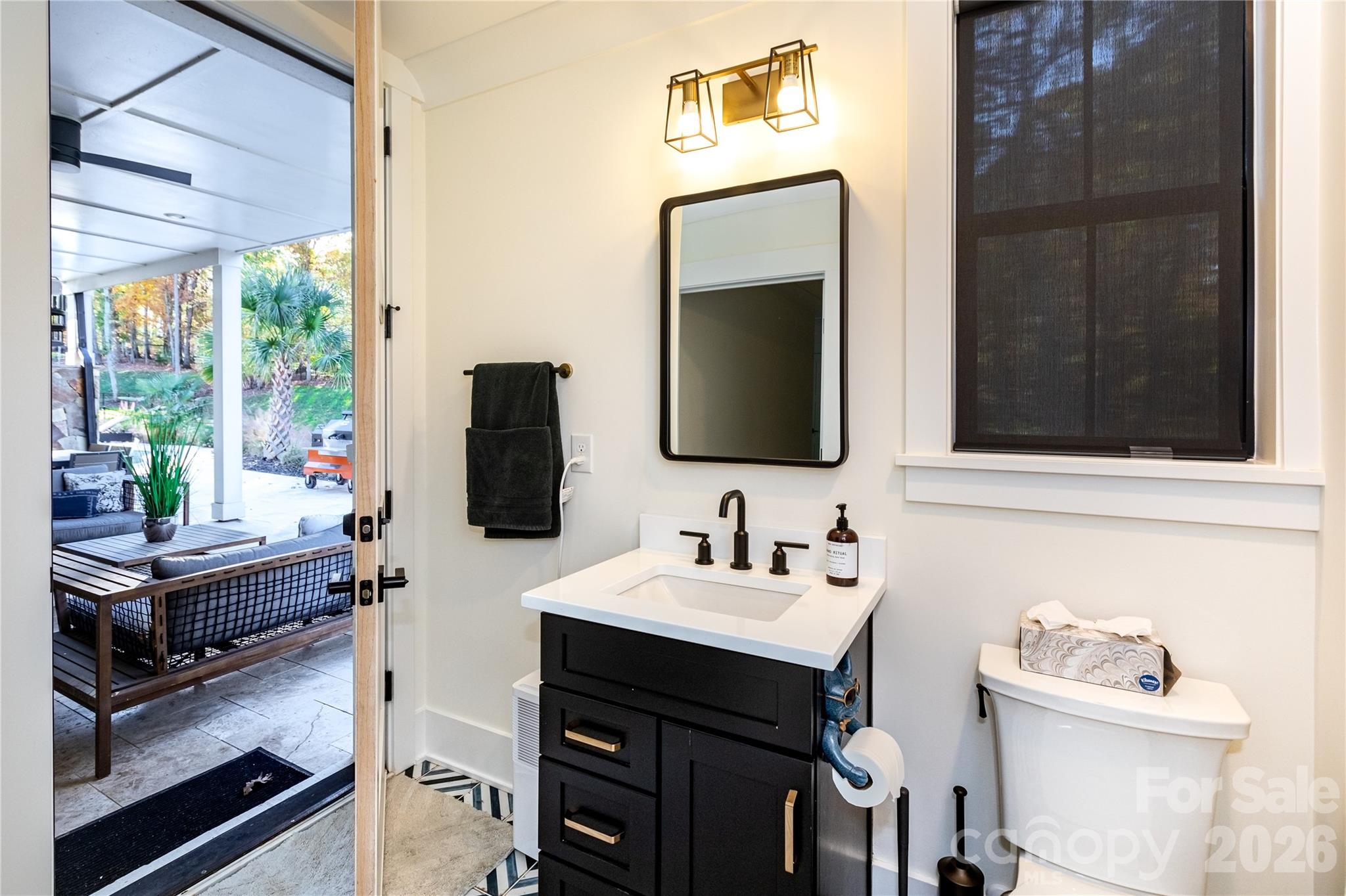 Bathroom opens to outside for easy access from the pool - 124 Direct Drive, Mooresville