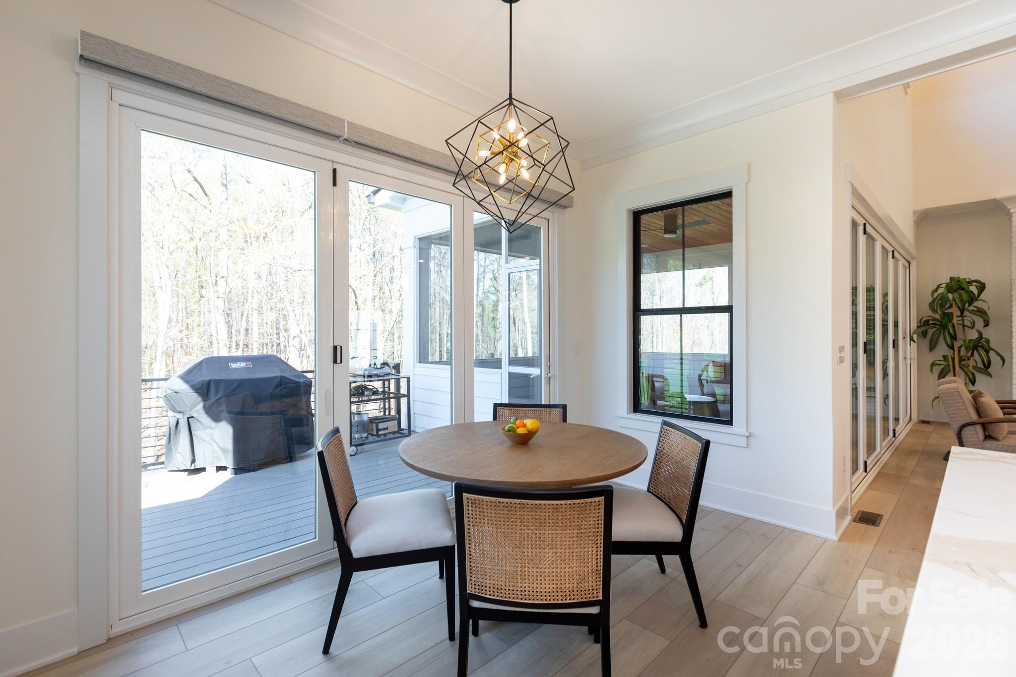 Bifold doors to the deck that fully open the space - 124 Direct Drive, Mooresville