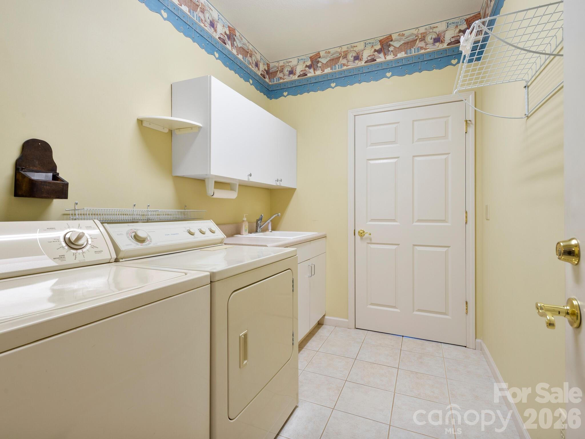 Laundry in Mud Room off garage - 17 Ashton Forest Court, Hendersonville