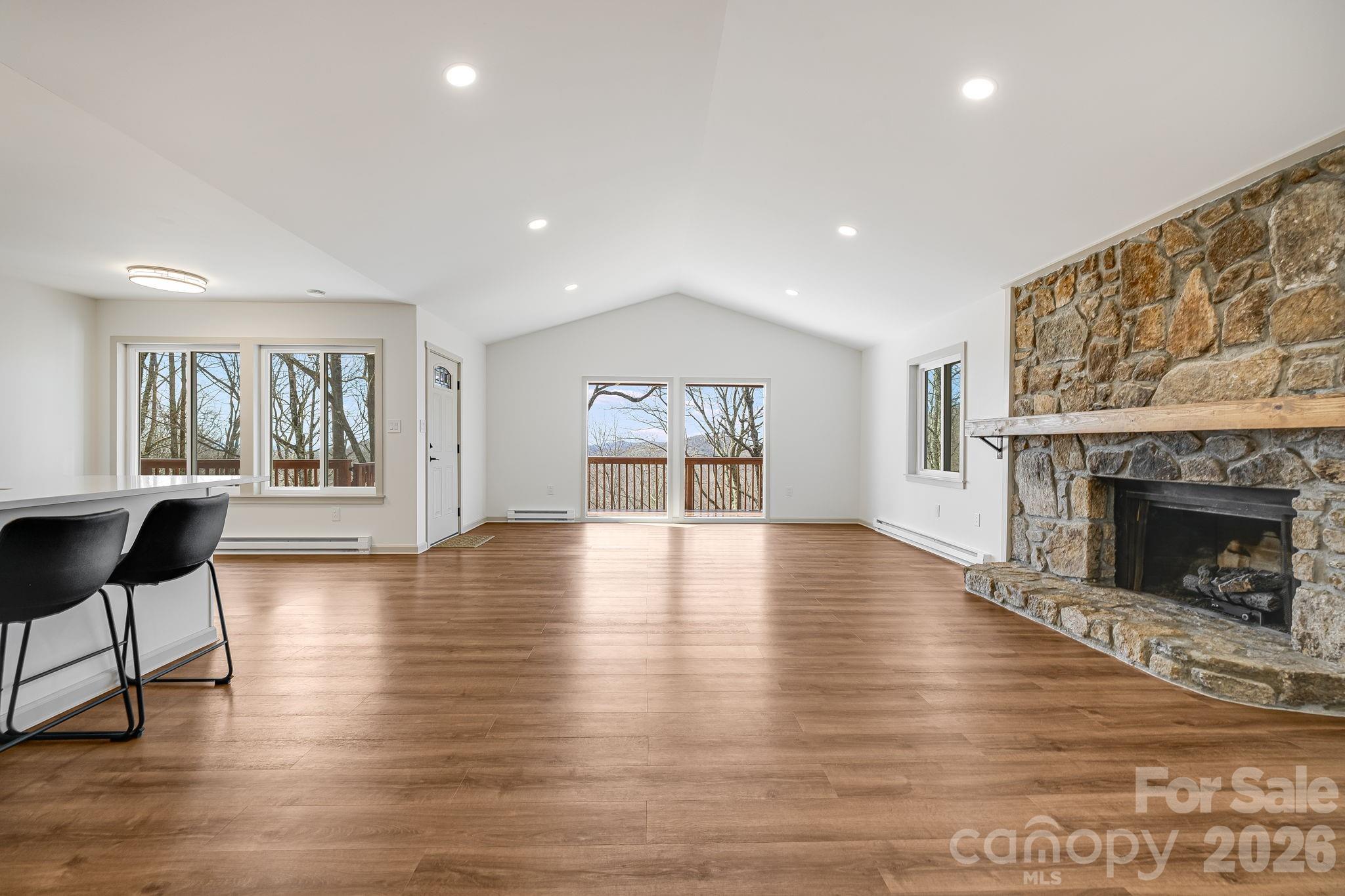 Great Room w/ Stone Fplc - 1065 Oak Ridge Lane, Mars Hill
