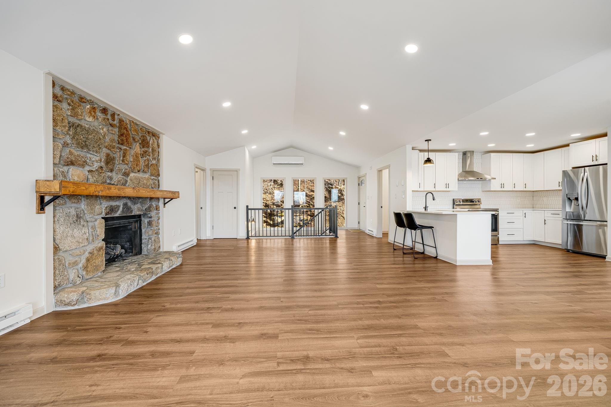 Great Room w/ Stone Fplc - 1065 Oak Ridge Lane, Mars Hill