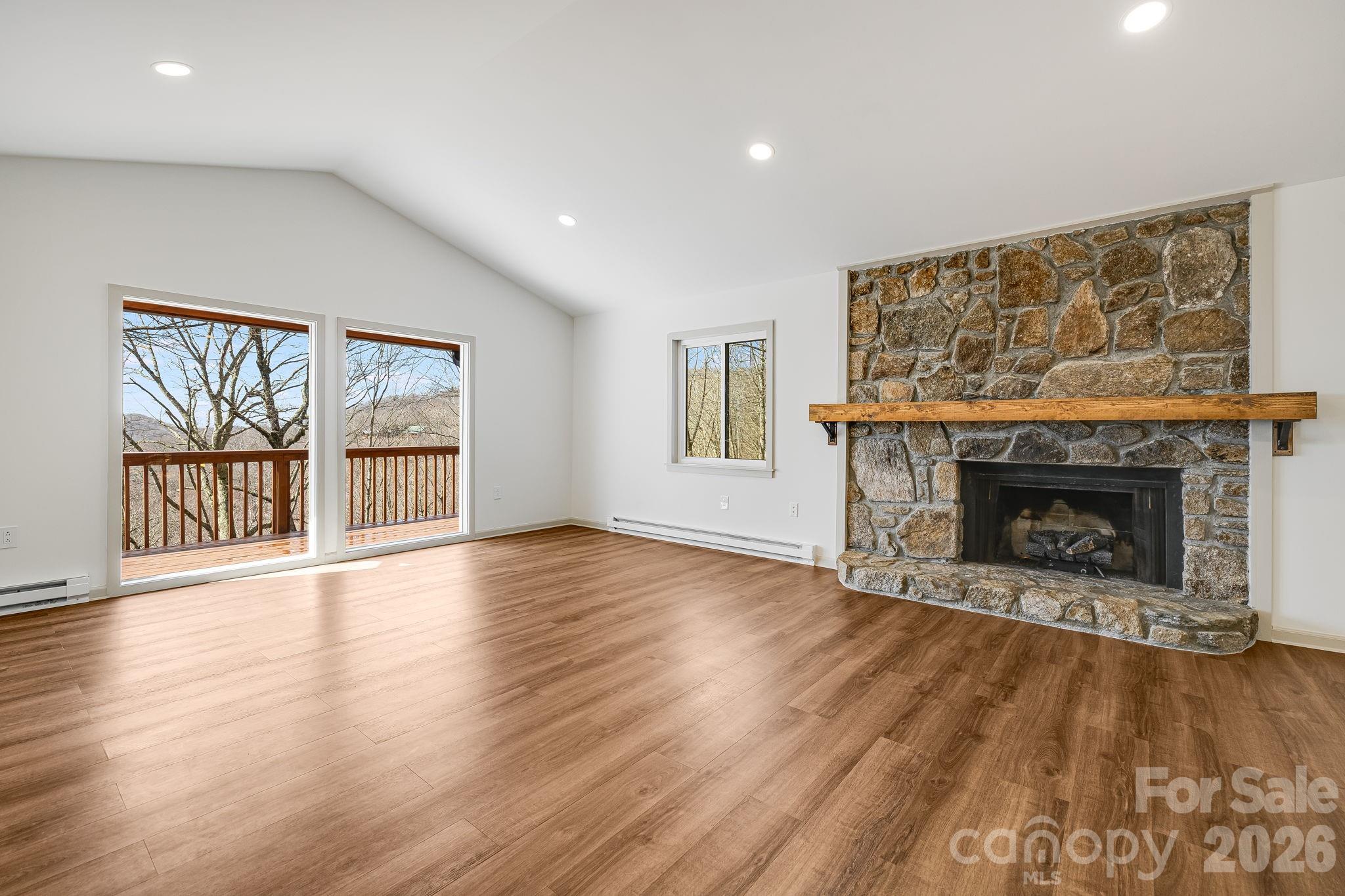Great Room w/ Stone Fplc - 1065 Oak Ridge Lane, Mars Hill