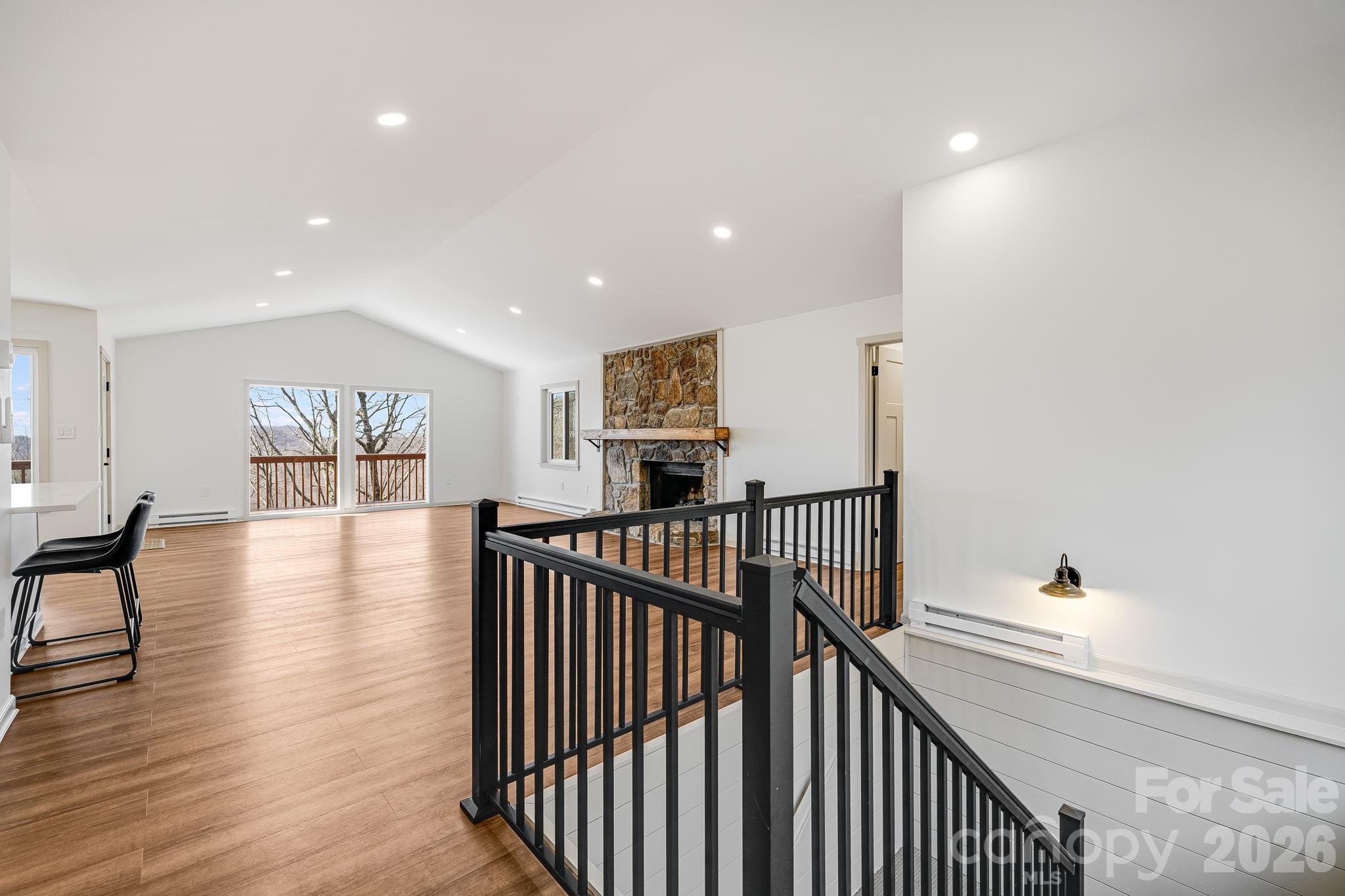 Great Room and Steps to Lower Level - 1065 Oak Ridge Lane, Mars Hill