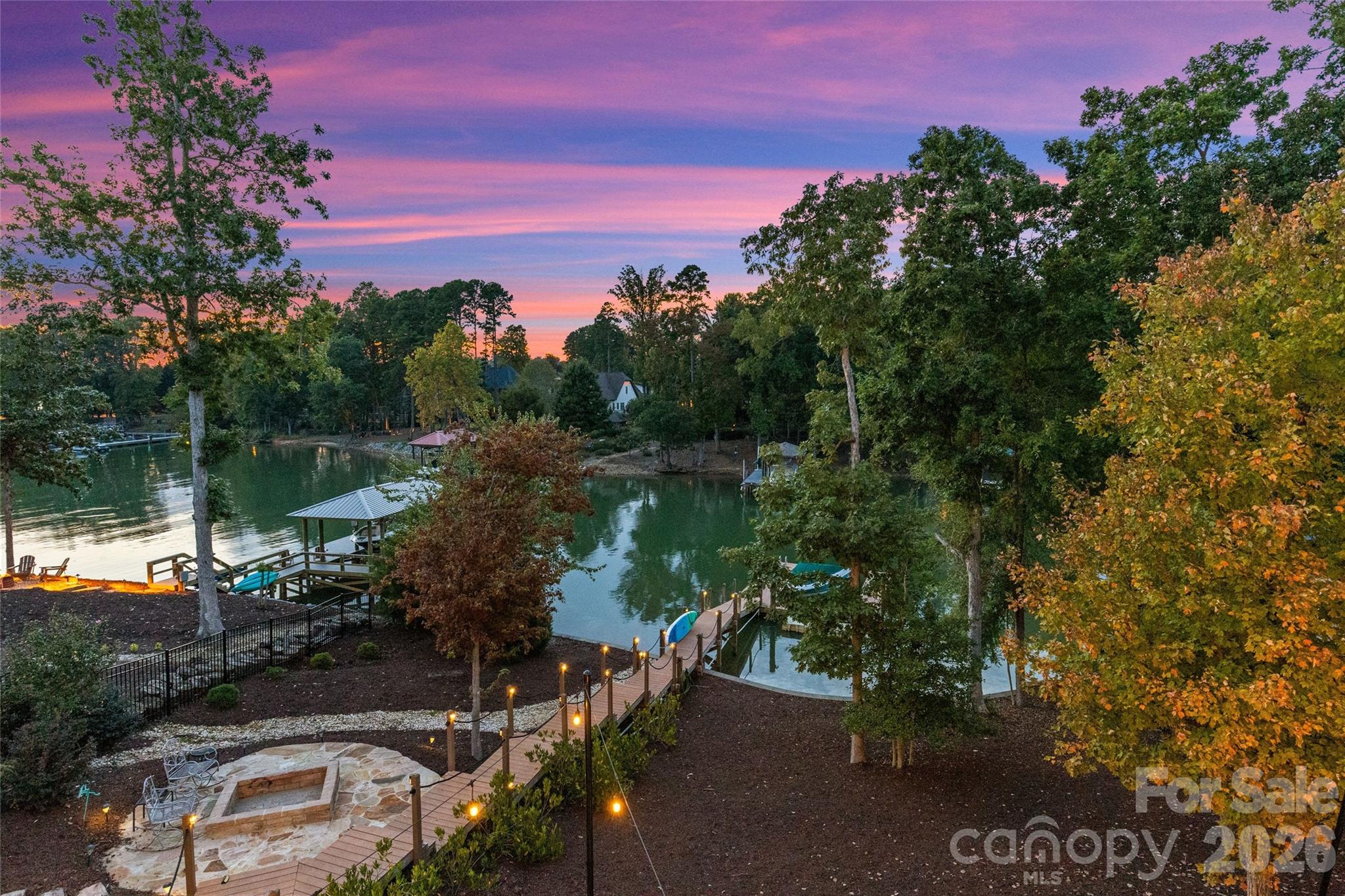 Outdoor fire pit, boardwalk & dock with stunning sunset views. - 6032 Headlands Court, Belmont