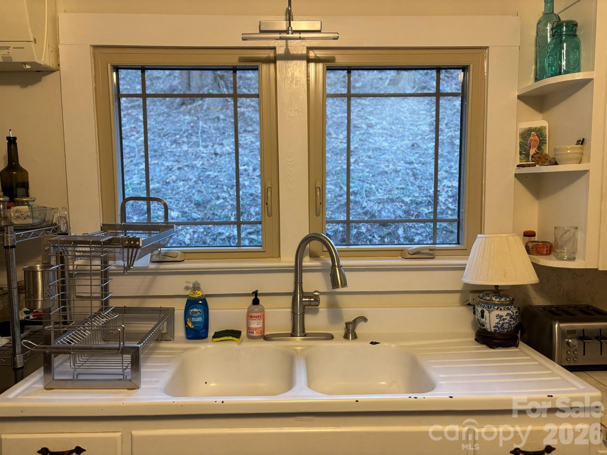 Main house kitchen with beautiful farm sink - 324 Marble Mine Road, Bakersville