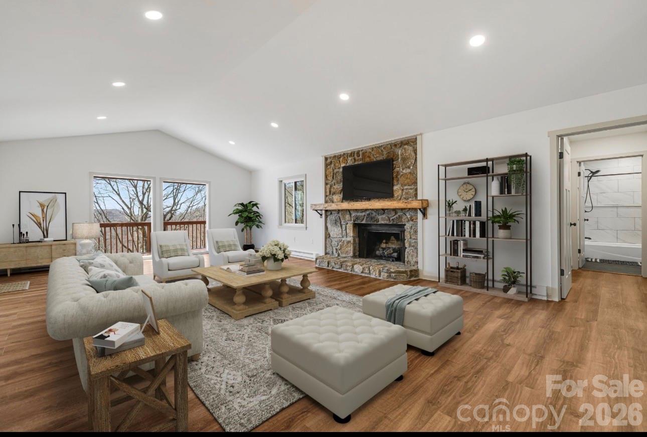 Great Room with Staging - 1065 Oak Ridge Lane, Mars Hill