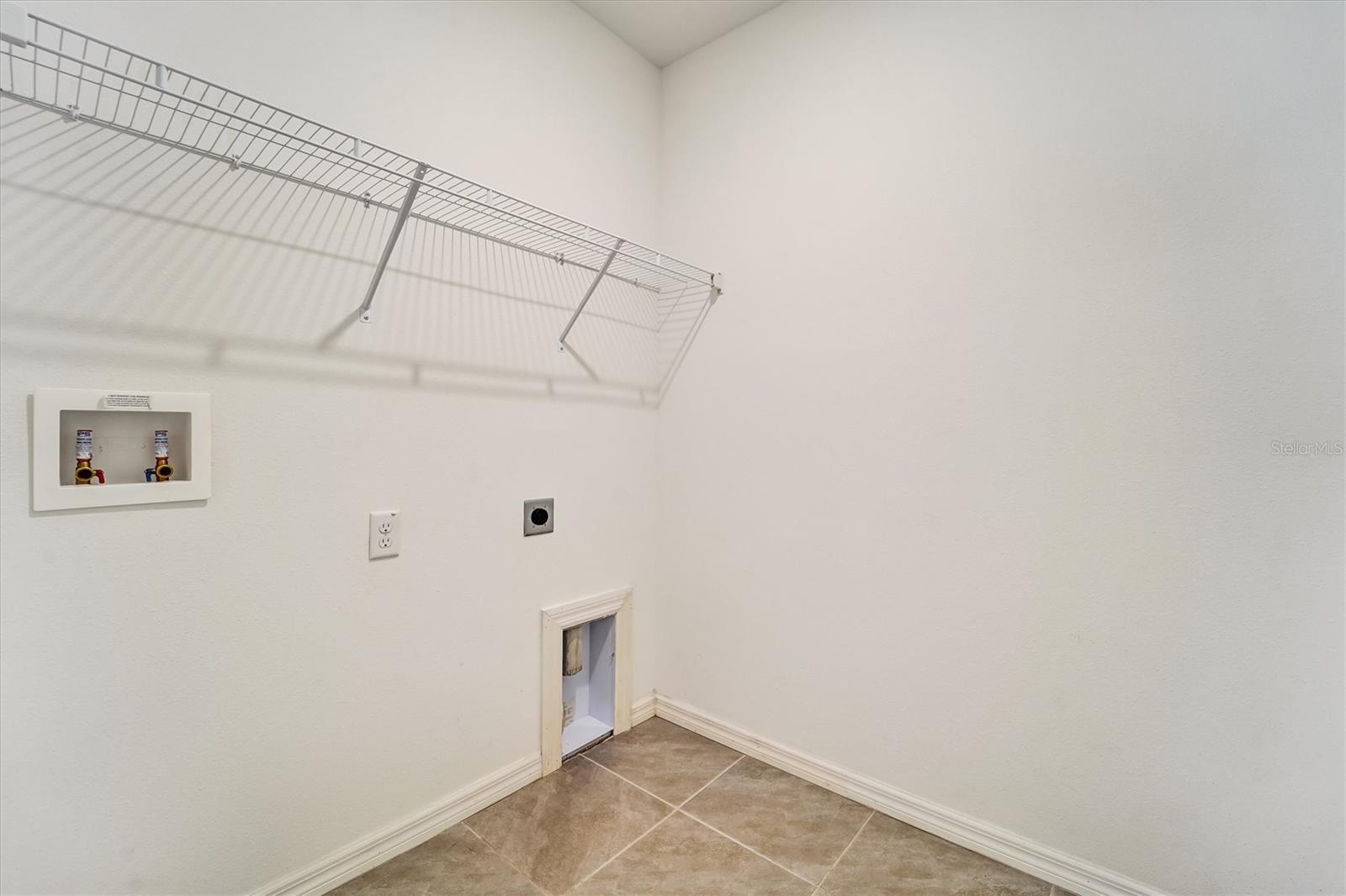Inside laundry room - 6963 SHELBY LYNN WAY, ZEPHYRHILLS