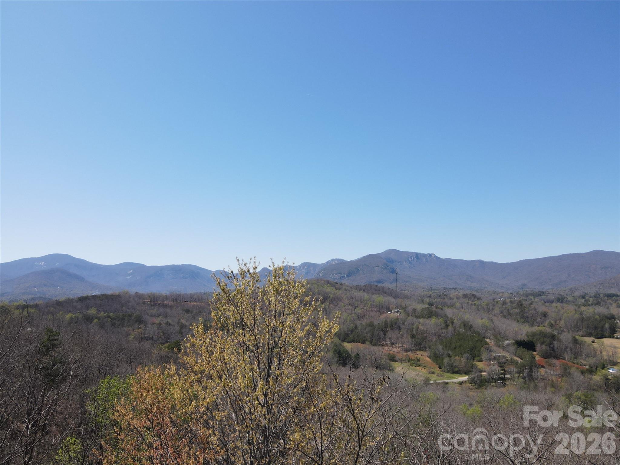 View to the approximate Northwest from Vista at Bills Mountain Lot 147 - #600 High Pines Loop. Taken from just above treetops at the road. - 600 High Pines Loop, Lake Lure