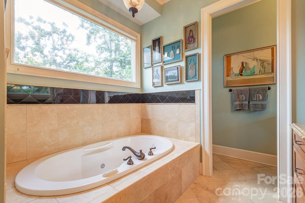 Primary bath with soaking tub and steam shower - 3 Gale Kelly Court, Weaverville