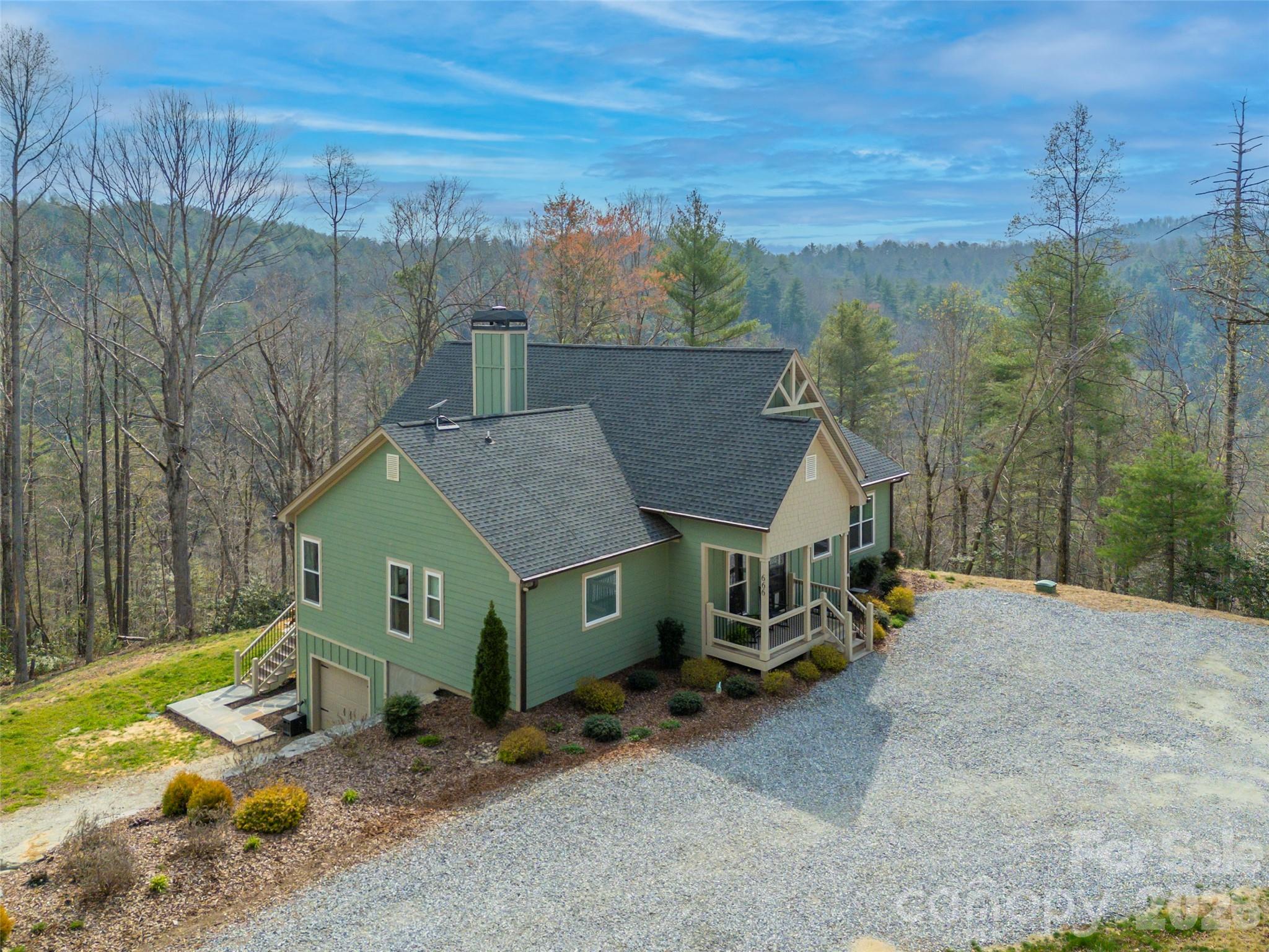Single Family Residence at 666 Never Blue Road, Flat Rock, photo 2 of 46