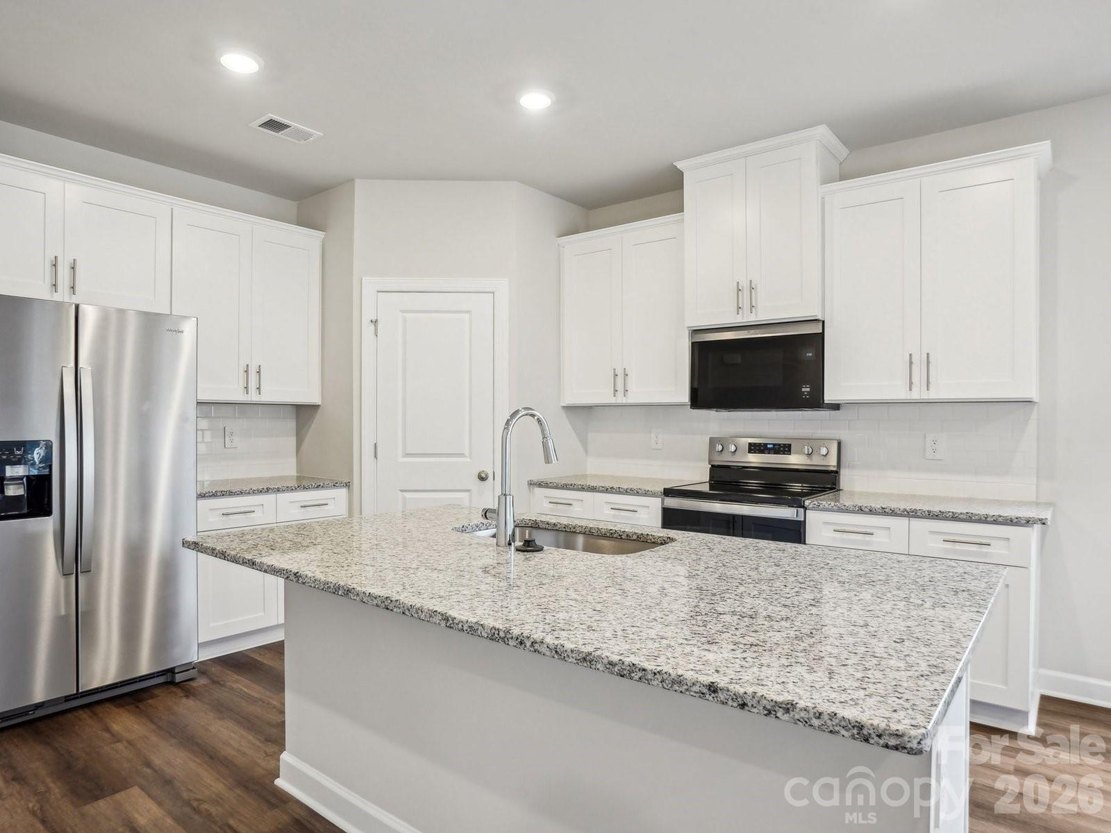 Photo is not of the actual home, but is an inspirational photo of builder’s model home and may depict options, furnishings, and/or decorator features that are not included - 2067 Sunflower Circle, Newton