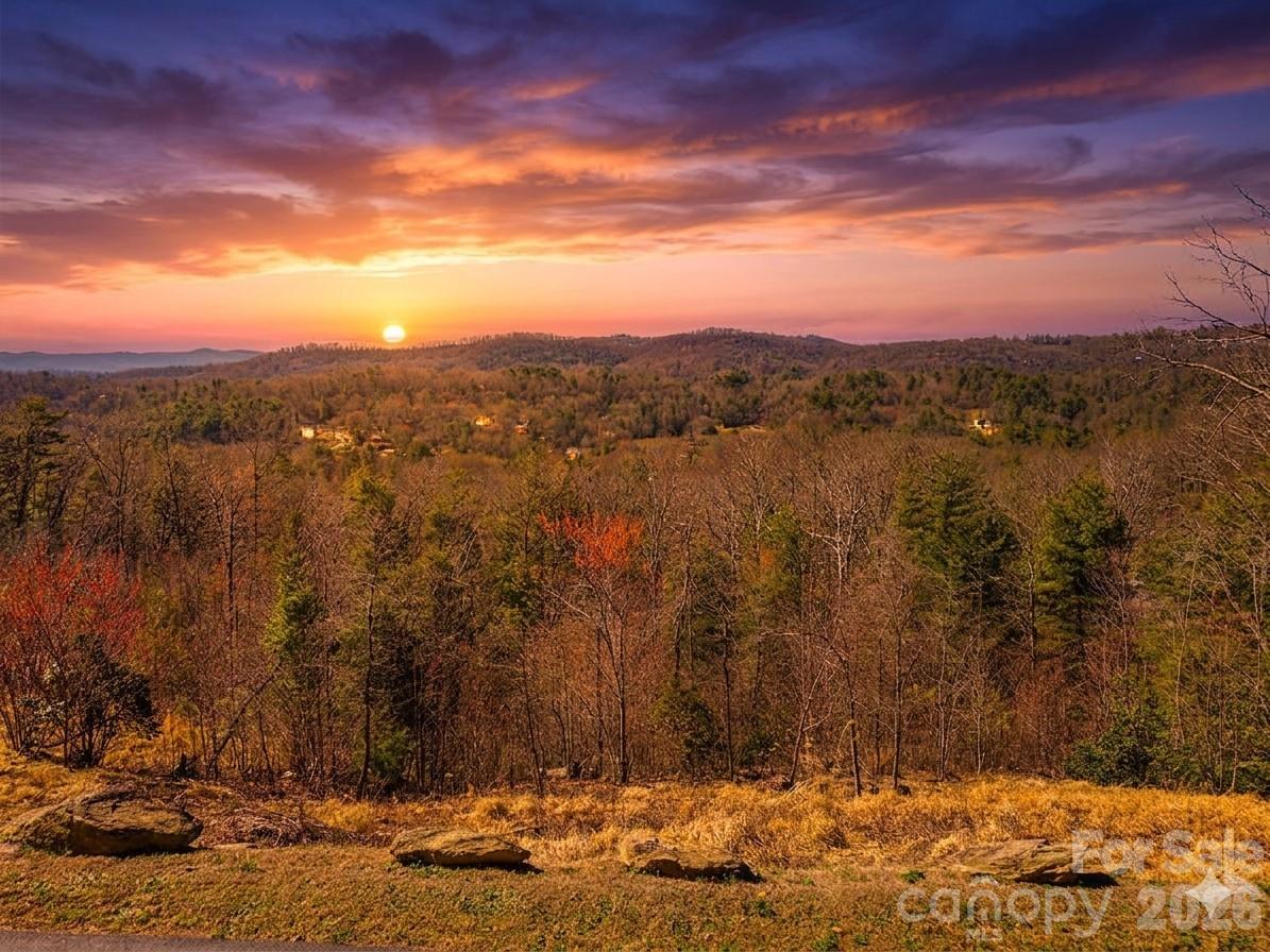 Lot faces towards the west. Sunset is virtually staged - 367 Curtain Bluff, Hendersonville