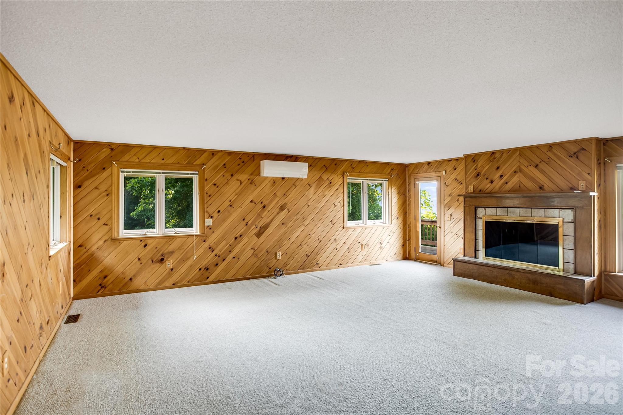 Primary bedroom with fireplace - 1087 Brigadoon Drive, Clyde