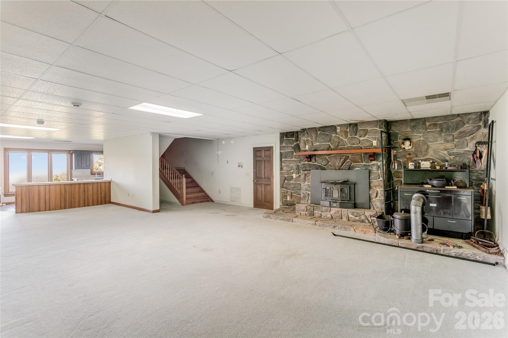 Lower level family room with fireplace - 1087 Brigadoon Drive, Clyde