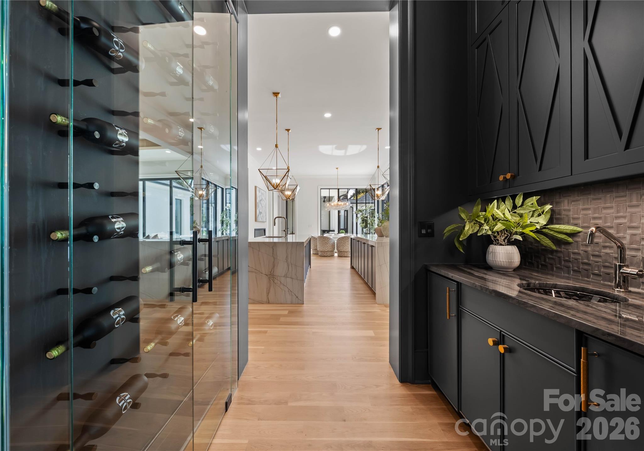Wet bar with glass wine cabinet - 2208 Overhill Road, Charlotte