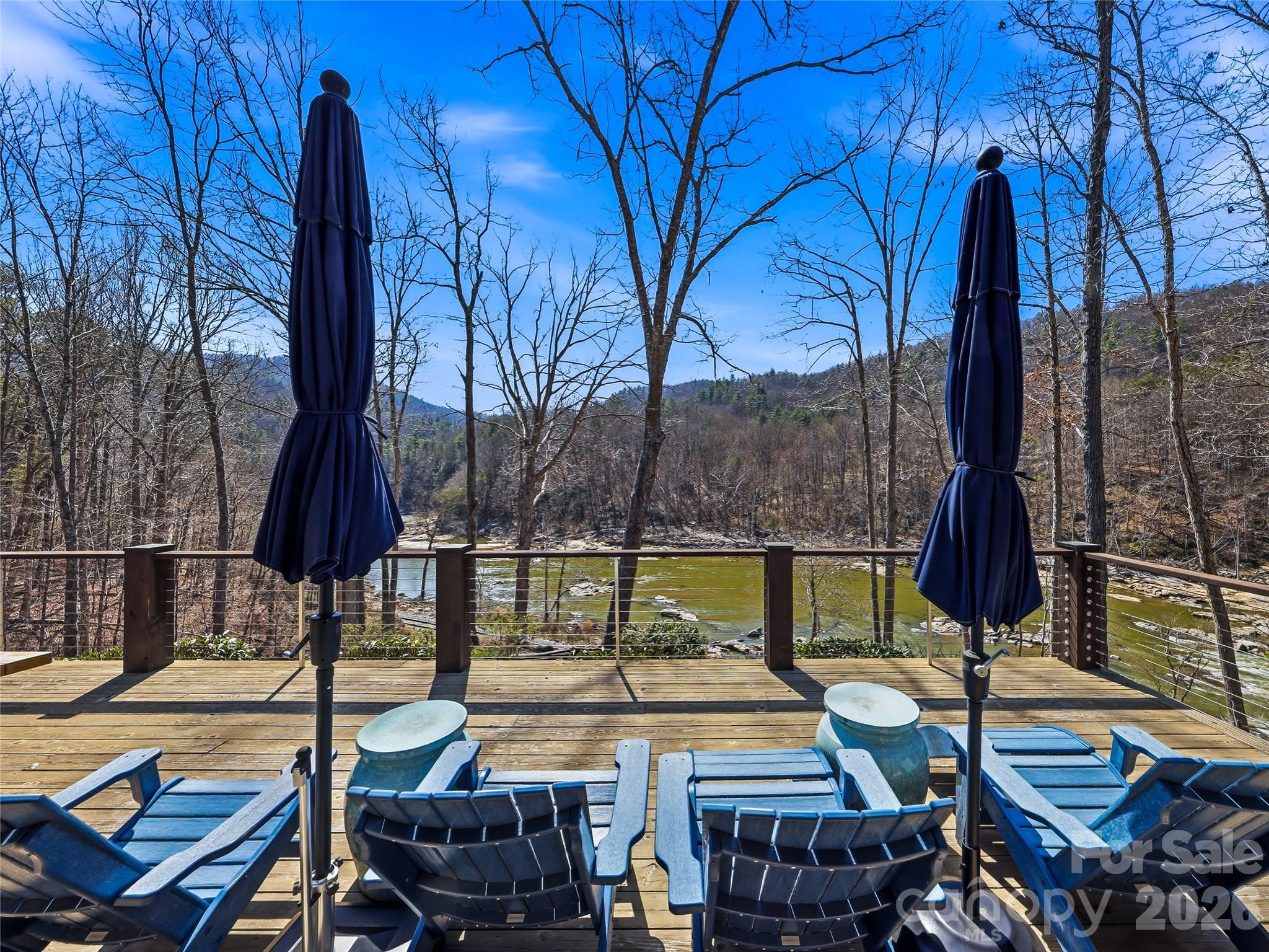 Perfect nap spot with the the river flowing over the rocks below. - 3735 French Broad Parkway, Marshall