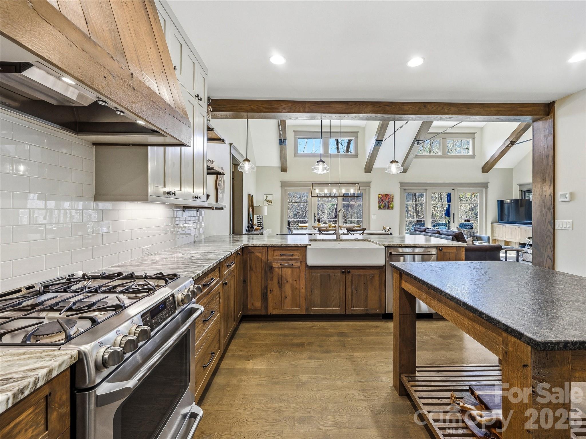 Kitchen open to dining and living areas. - 3735 French Broad Parkway, Marshall