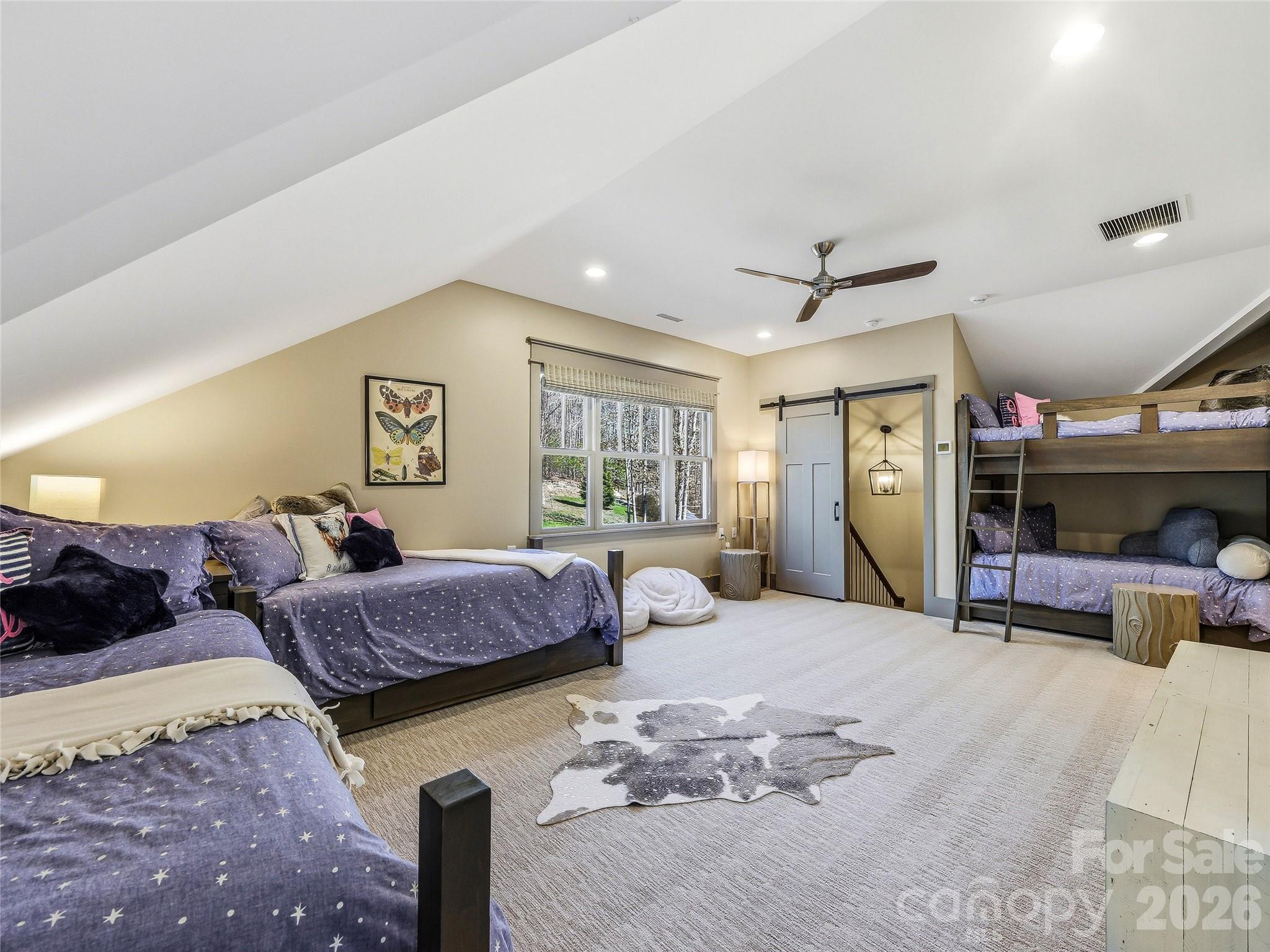 Upper level bunk/bonus room with ensuite bathroom and walk-in closet. - 3735 French Broad Parkway, Marshall