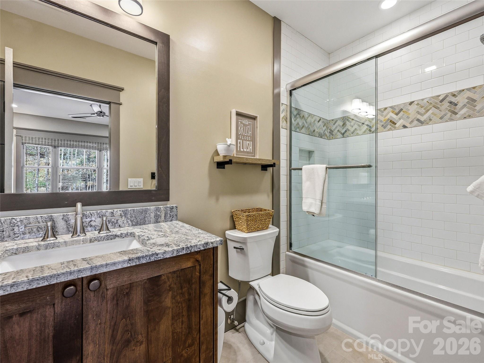 Upper level bathroom with tub/shower. - 3735 French Broad Parkway, Marshall