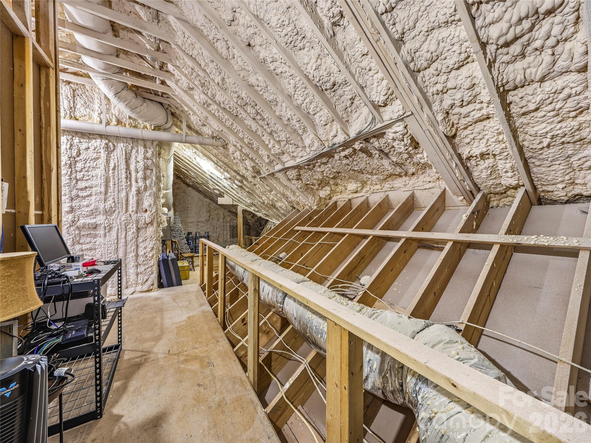 A portion of the climate controlled walk-in storage off of upper level. - 3735 French Broad Parkway, Marshall