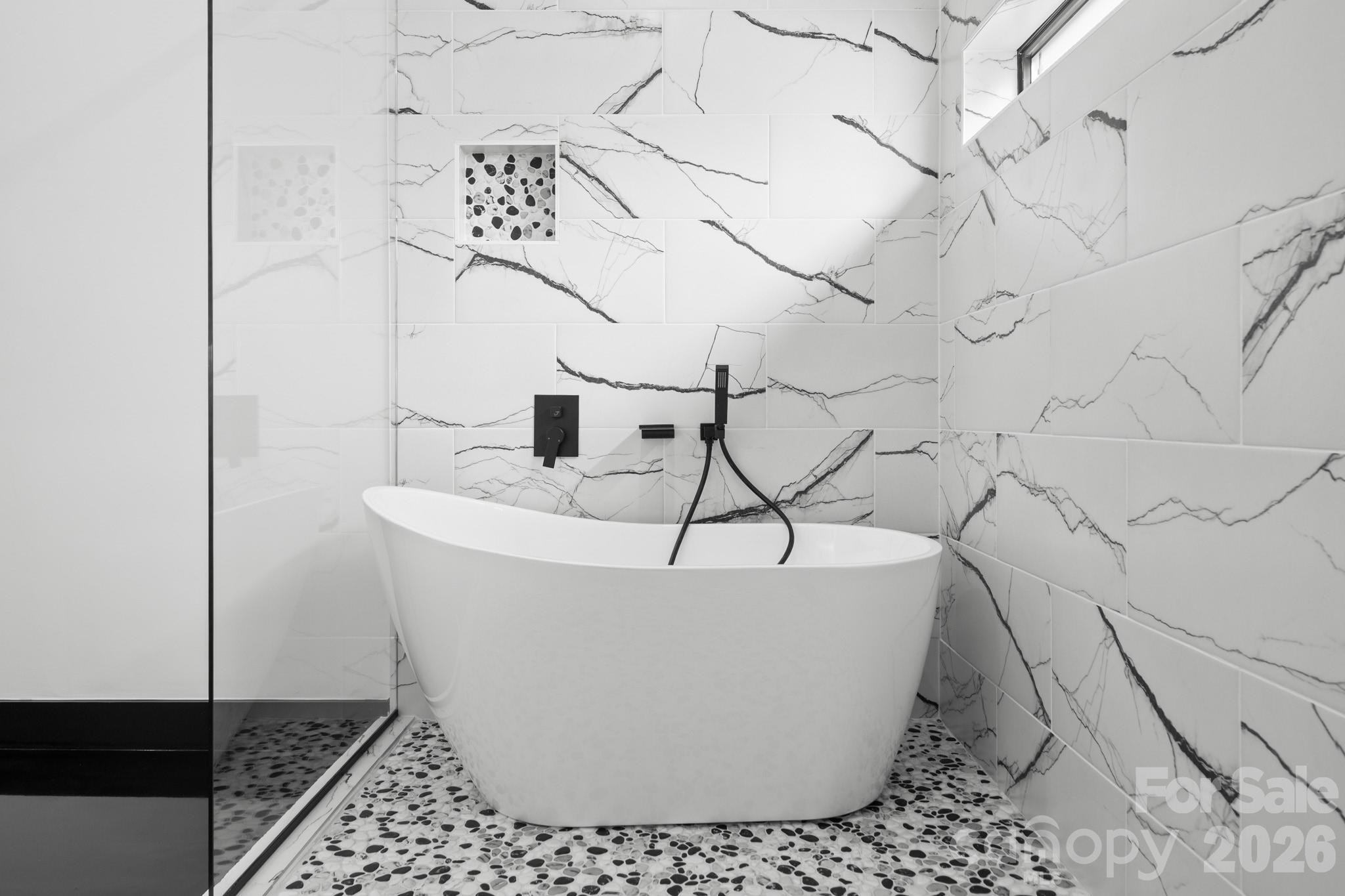 Lower level en suite bathroom with soaker tub and shower combo - 74 Jeranna Road, Mills River