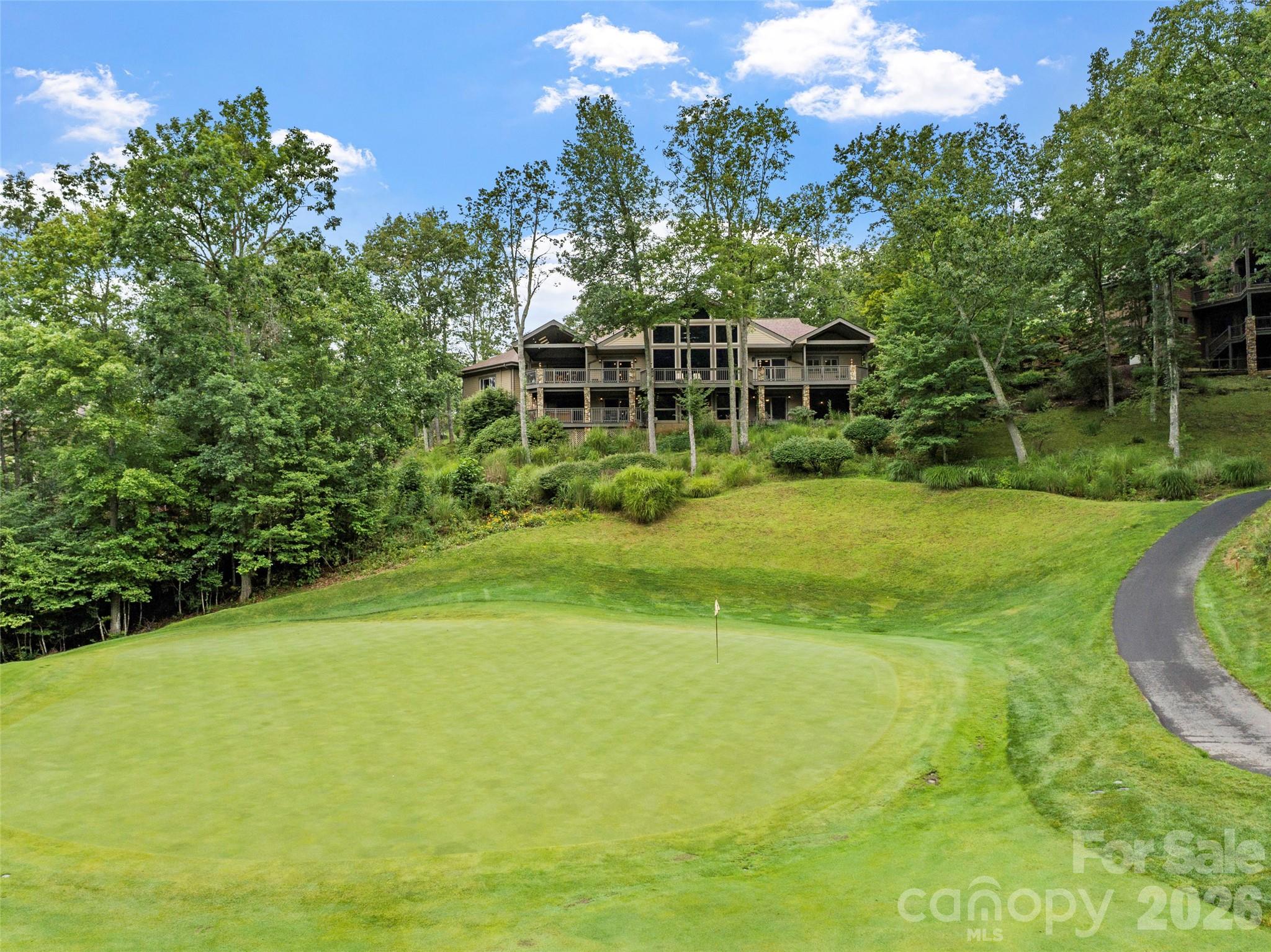 Exquisitely crafted estate with sweeping views of the 11th hole - 151 Austin Mountain Drive, Burnsville
