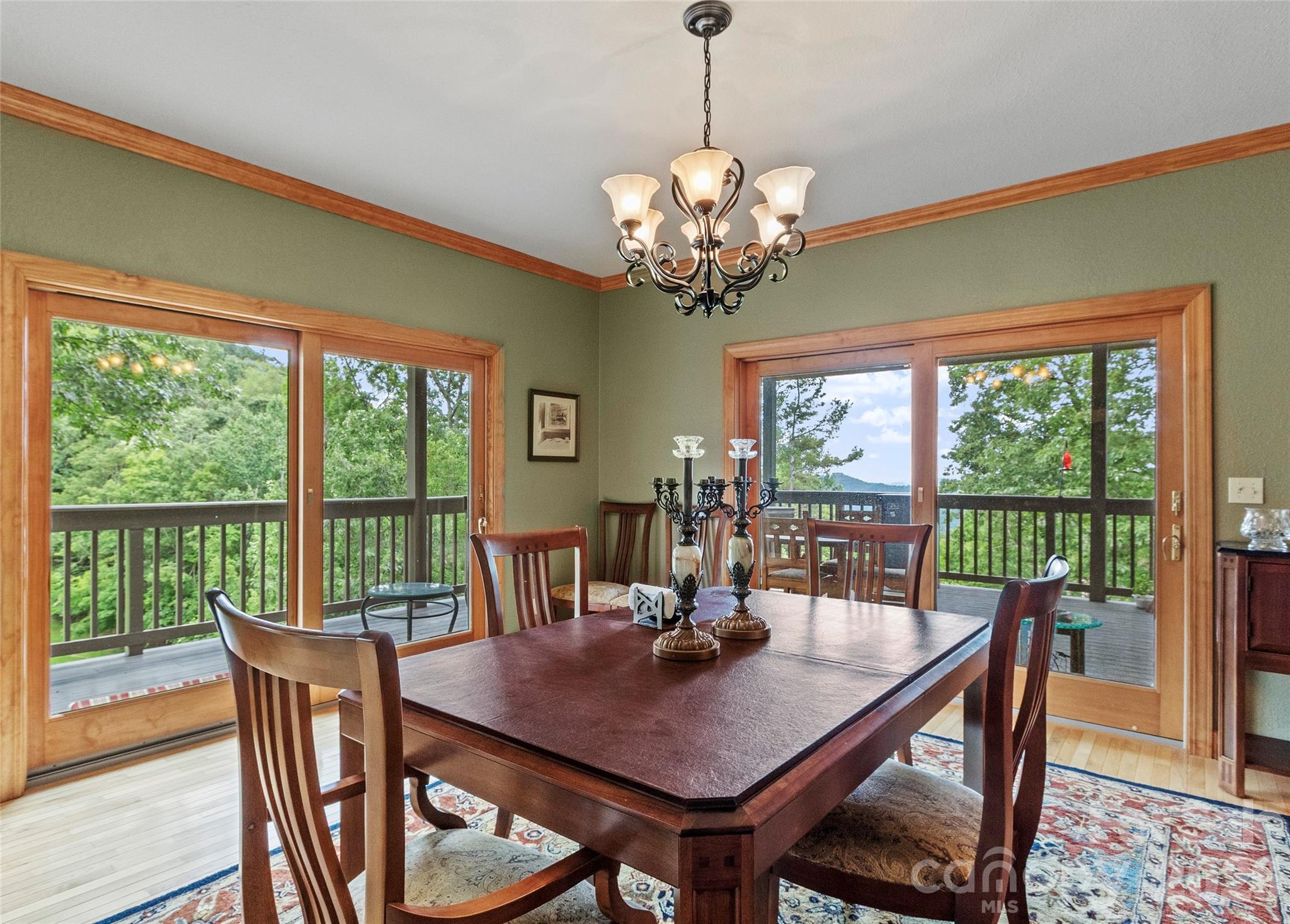 Bright dining space framed with scenic vistas - 151 Austin Mountain Drive, Burnsville