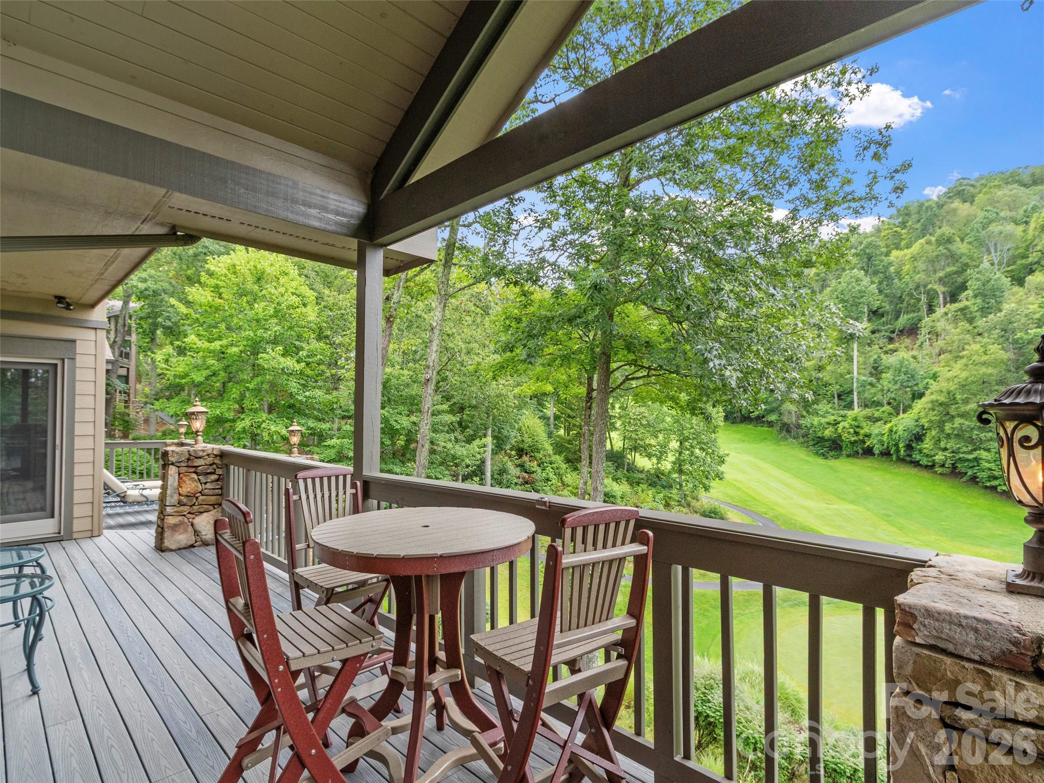 Enjoy lunch on the deck while watching golfers on the fairway - 151 Austin Mountain Drive, Burnsville