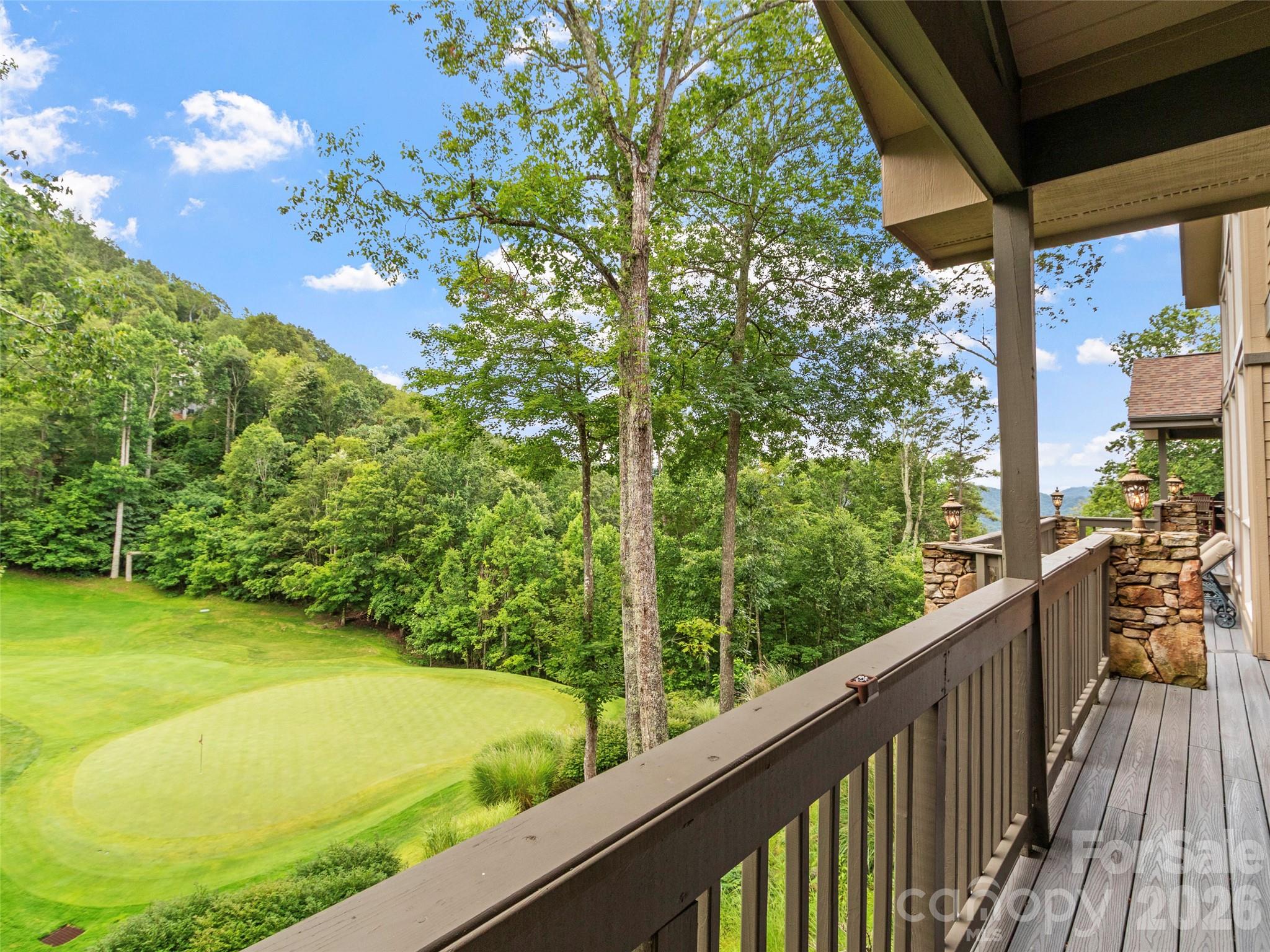 Breathtaking view of the mountains and 11th hole from the deck - 151 Austin Mountain Drive, Burnsville