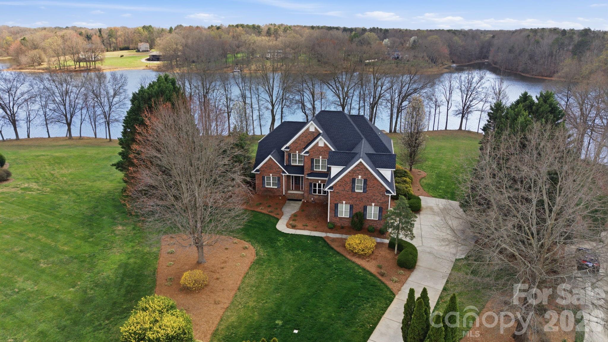 Single Family Residence at 1132 Village Lake Drive, Monroe, photo 2 of 43