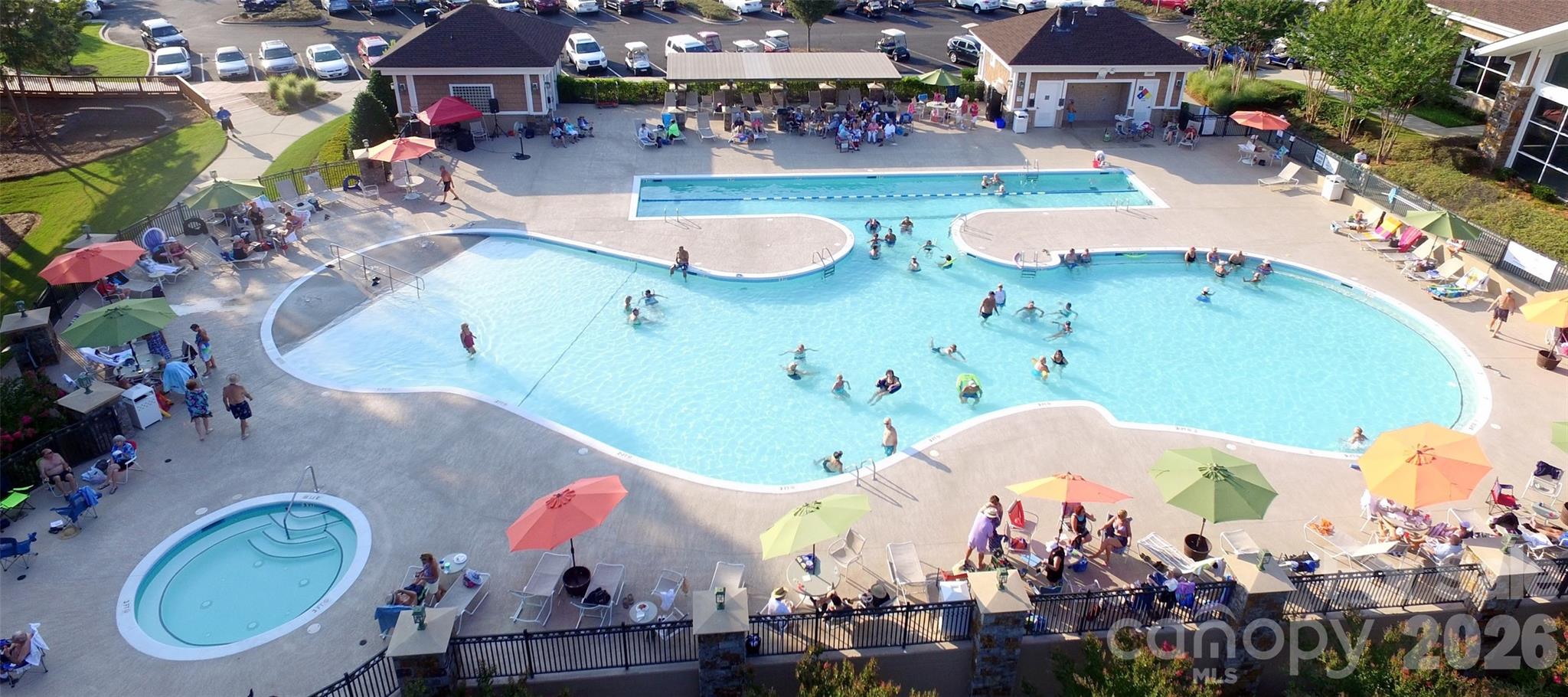 The Lake House pool is one of three pools at Sun City Carolina Lakes. There is also a pool inside The Lake House and another outdoor pool at The Lodge. - 49015 Gladiolus Street, Indian Land