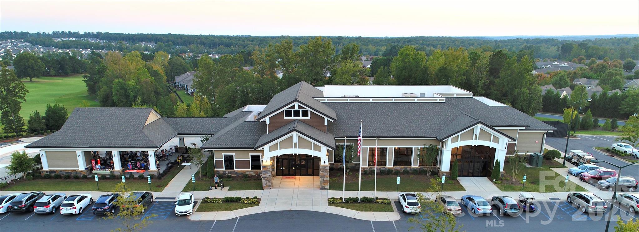 The Lodge houses an outdoor pool, pickleball courts, outside workout stations, a pavilion and open outdoor area where you can relax by the large firepit. It is home to SCCL's Performing Arts Club and the interior ballroom is used for performances and a wide variety of SCCL club and social activities. SCCL Veterans are honored both inside and outside of The Lodge. Be sure to check out the tributes to our Vets in the lobby and at the Veterans Memorial near the pavilion. - 49015 Gladiolus Street, Indian Land