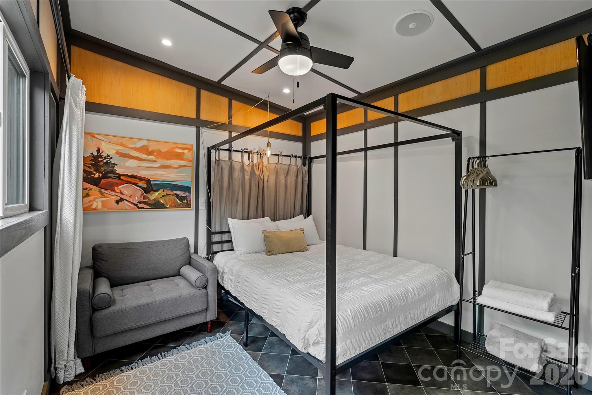 MINI - Studio bedroom in living area w/ cozy chair - 787 Ridge Road, Marion