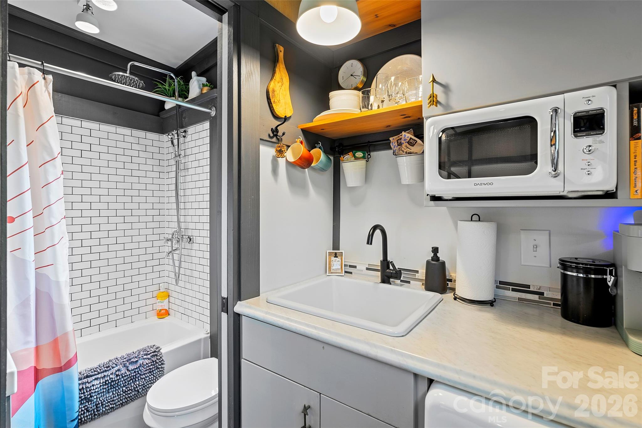 MINI - Bathroom w/ Shower and slider door off Kitchenette area - 787 Ridge Road, Marion