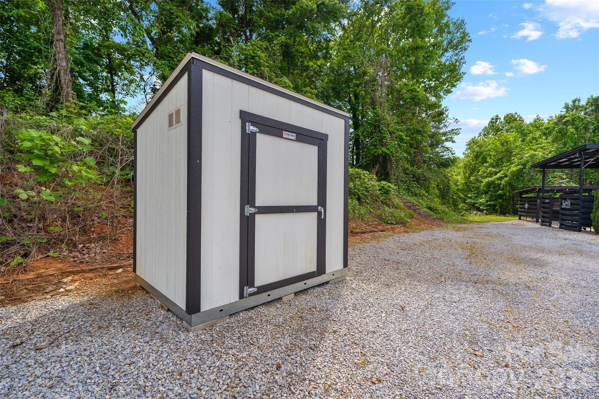Extra storage shed located between MAC + MINI in driveway area - 787 Ridge Road, Marion
