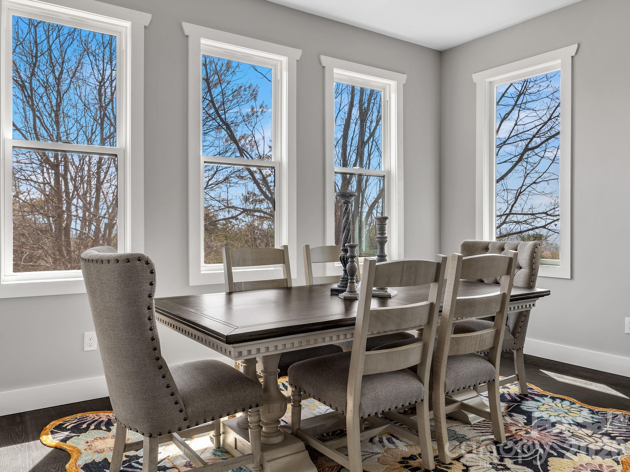 Dining area with large windows. - 345 Preservation Trail, Columbus