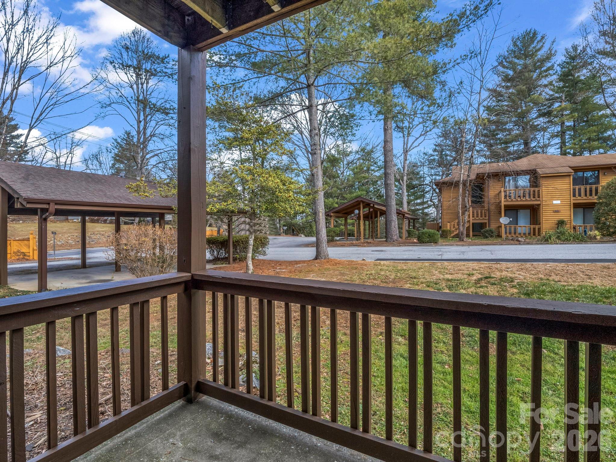One covered carport space for each unit. - 520 Courtwood Lane, Hendersonville