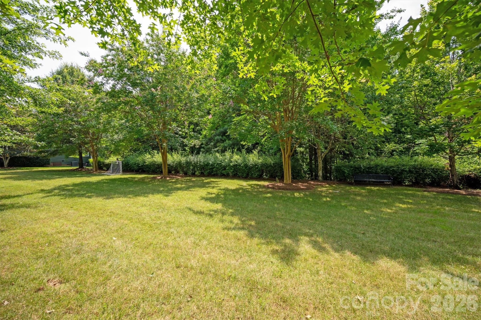 Pocket park in front of the house and direct access to community walking trails - 869 Stratford Run Drive, Fort Mill