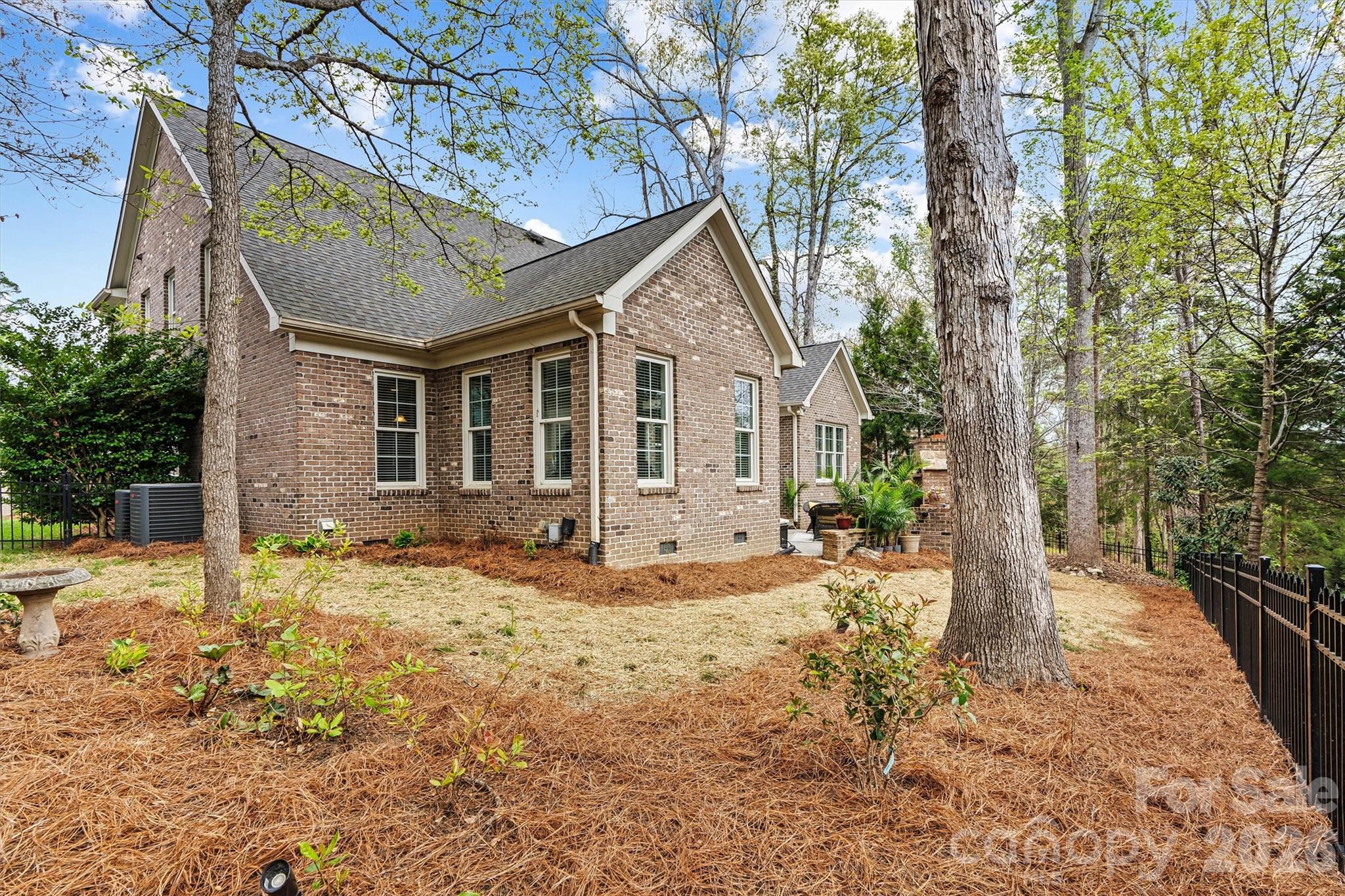 Fenced backyard with room for pets, play, and outdoor enjoyment - 224 Birdie Drive, Stanley