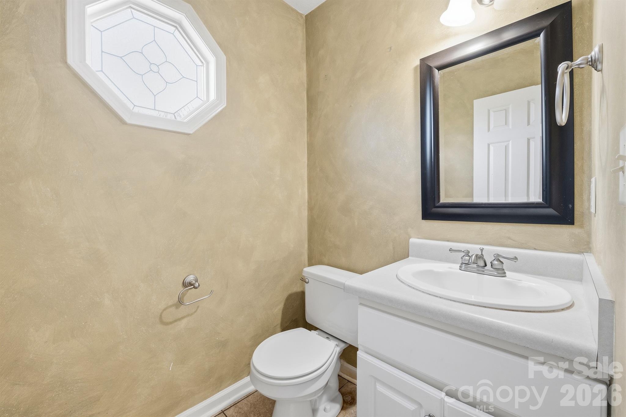 Half Bath on first floor - 5406 Winding Oak Drive, Hickory