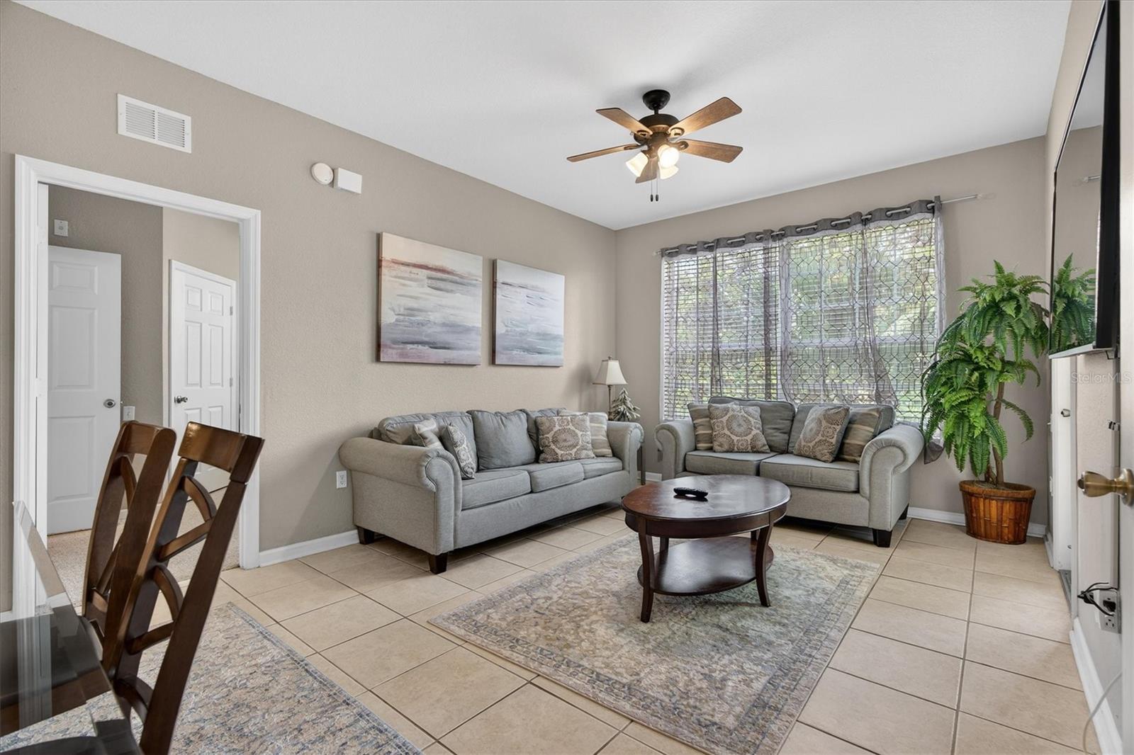 Living Room - 7664 COMROW ST #304, KISSIMMEE