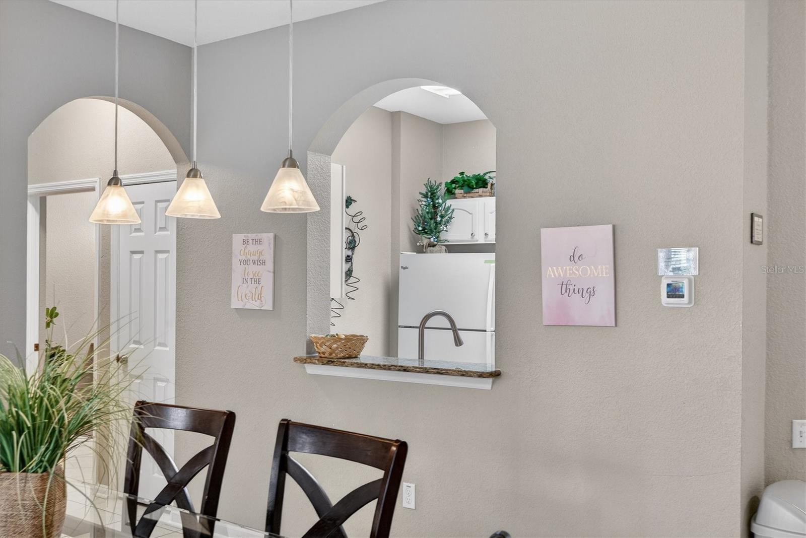 Dining & Kitchen View - 7664 COMROW ST #304, KISSIMMEE
