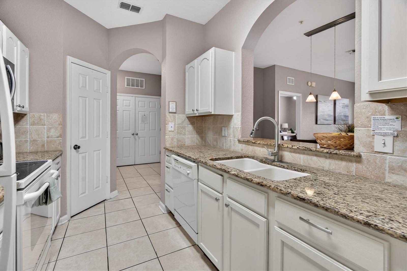 Kitchen with Granite Countertops - 7664 COMROW ST #304, KISSIMMEE